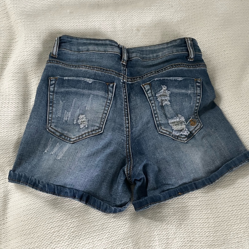 Denim shorts
Size three